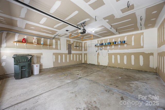 4219 Shasta Cir, Clover, SC 29710 - garage with a garage door opener and electric panel