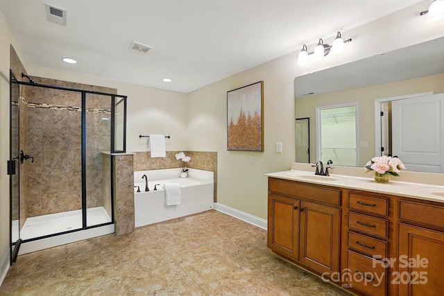 404 Brookridge Dr, Mount Holly, NC 28120 - full bathroom featuring a shower stall, a bath, and double vanity