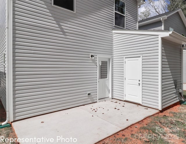 558 Ridge Ave, Mooresville, NC 28115 - doorway to property with a patio