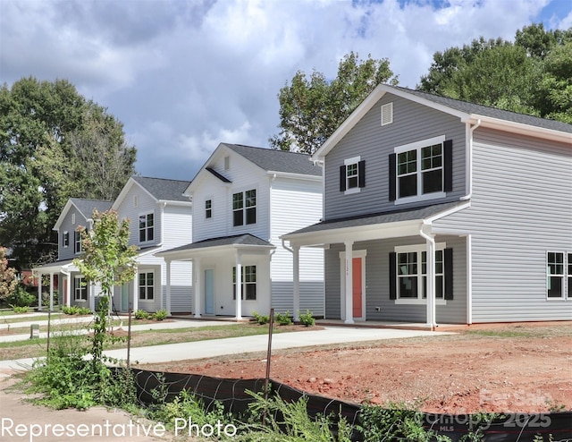 558 Ridge Ave, Mooresville, NC 28115 - traditional home featuring a porch