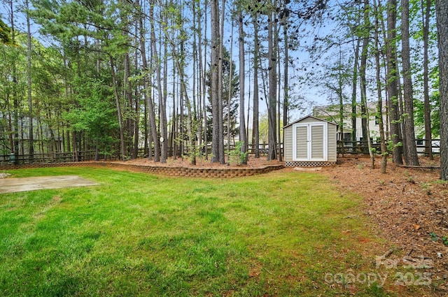 212 Kilborne Rd, Mooresville, NC 28117 - view of yard with a shed, an outdoor structure, and fence