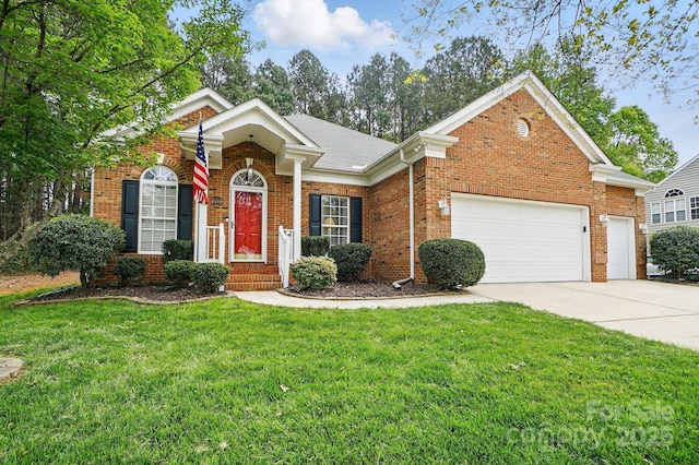 212 Kilborne Rd, Mooresville, NC 28117 - view of front of house with a garage, a front yard, concrete driveway, and brick siding