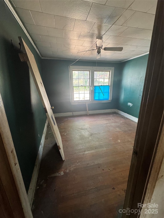 133 Green Pl, Lenoir, NC 28645 - empty room with ornamental molding, baseboards, a ceiling fan, and wood-type flooring