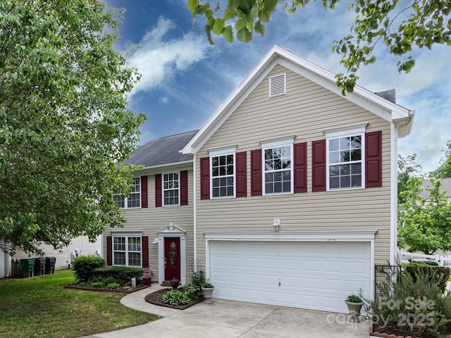 view of front of property with an attached garage and driveway