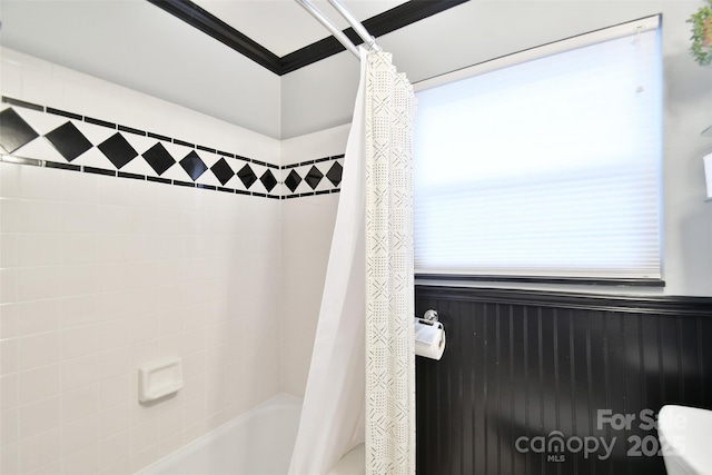 bathroom with shower / bath combo and toilet