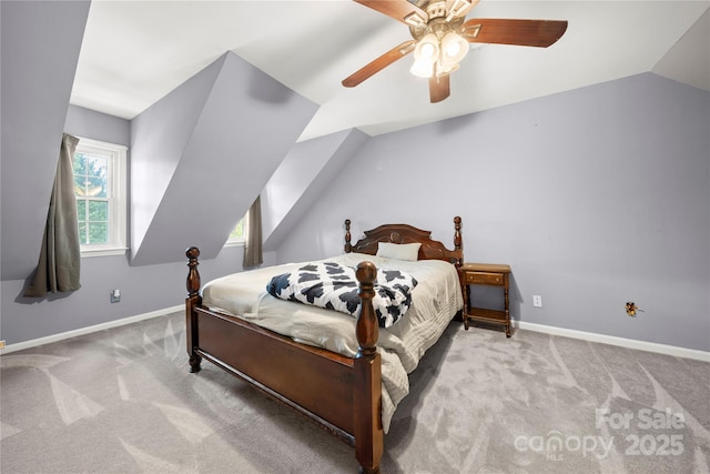 bedroom featuring baseboards, carpet flooring, ceiling fan, and vaulted ceiling