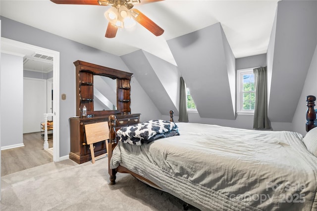 carpeted bedroom with visible vents and a ceiling fan
