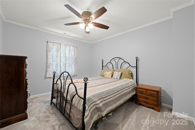 bedroom featuring carpet flooring, baseboards, ornamental molding, and a ceiling fan