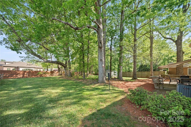 view of yard with fence