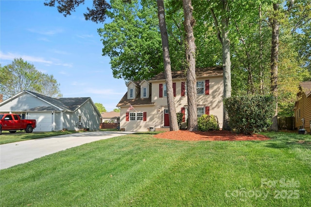 colonial-style house with a front lawn and concrete driveway