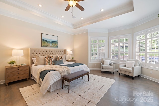 133 Crooked Branch Way, Troutman, NC 28166 - bedroom with baseboards, wood finished floors, and a tray ceiling