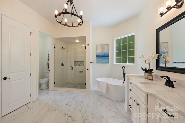 133 Crooked Branch Way, Troutman, NC 28166 - full bathroom with a shower stall, a notable chandelier, toilet, vanity, and a freestanding bath