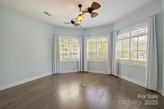 133 Crooked Branch Way, Troutman, NC 28166 - empty room with baseboards, visible vents, wood finished floors, and a ceiling fan