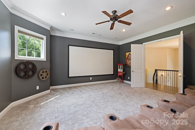 133 Crooked Branch Way, Troutman, NC 28166 - home theater featuring carpet, a ceiling fan, ornamental molding, and baseboards