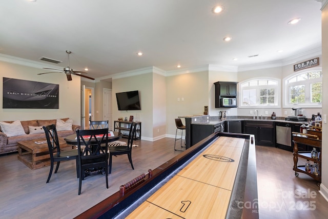 133 Crooked Branch Way, Troutman, NC 28166 - game room featuring a sink, recessed lighting, visible vents, and wood finished floors