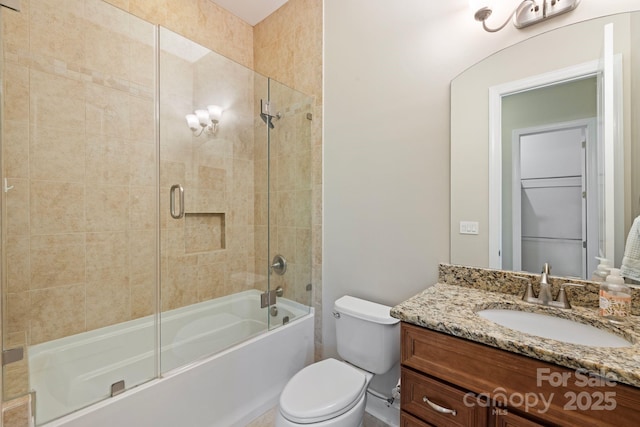 133 Crooked Branch Way, Troutman, NC 28166 - bathroom featuring toilet, vanity, and shower / bath combination with glass door