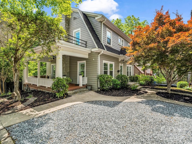 201 W 6th St, Rutherfordton, NC 28139 - view of front of home featuring covered porch, a balcony, and a shingled roof
