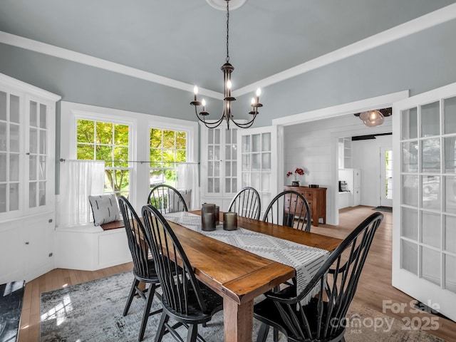 201 W 6th St, Rutherfordton, NC 28139 - dining space with a chandelier and wood finished floors