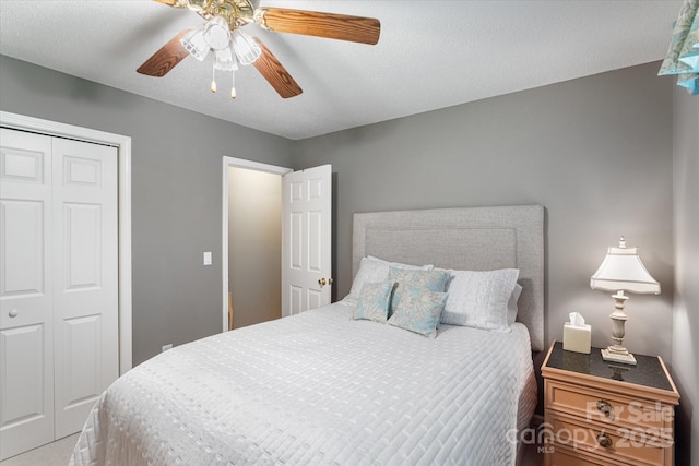 bedroom with a closet and ceiling fan