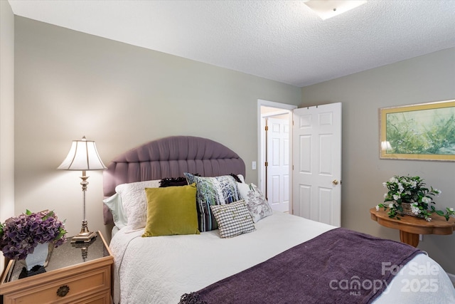 bedroom with a textured ceiling