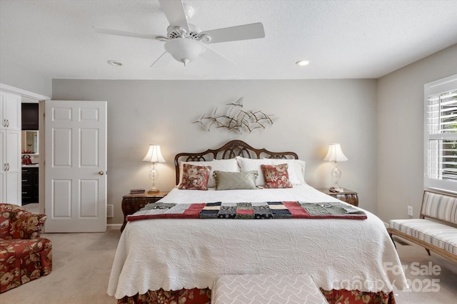 bedroom featuring recessed lighting, ceiling fan, and light carpet