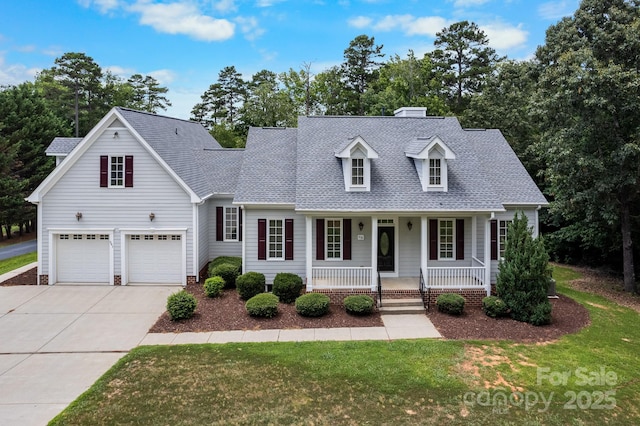 591 Emerald Isle Ct, Lexington, NC 27292 - cape cod home featuring a shingled roof, a porch, a garage, concrete driveway, and a front lawn