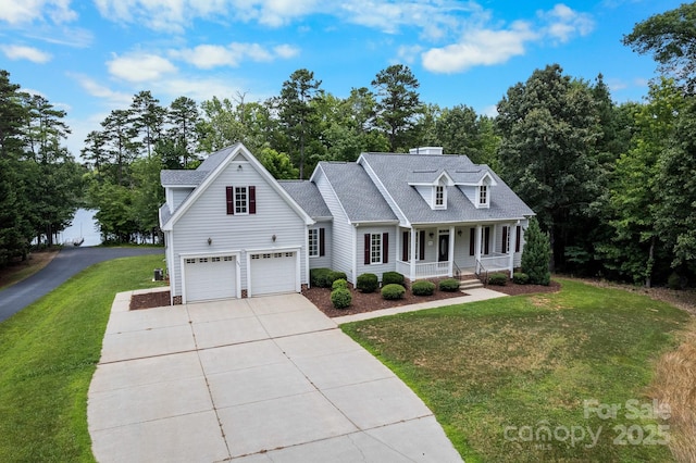 591 Emerald Isle Ct, Lexington, NC 27292 - view of front of home featuring a porch, roof with shingles, a front lawn, an attached garage, and concrete driveway