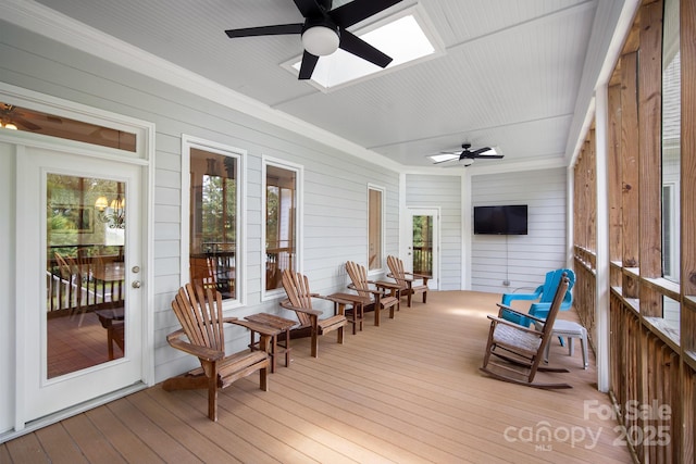 591 Emerald Isle Ct, Lexington, NC 27292 - sunroom with hardwood / wood-style flooring, a ceiling fan, and a skylight