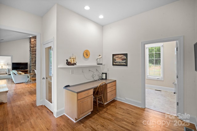 591 Emerald Isle Ct, Lexington, NC 27292 - office featuring light wood-style flooring, visible vents, recessed lighting, built in desk, and baseboards
