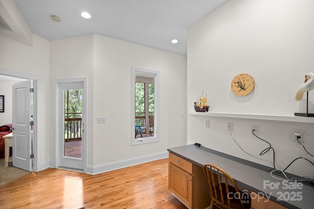 591 Emerald Isle Ct, Lexington, NC 27292 - home office with recessed lighting, built in desk, light wood-type flooring, and baseboards