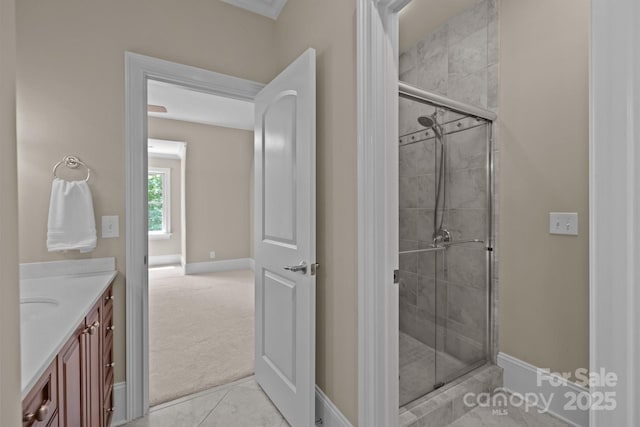 914 Elizabeth Ln, Matthews, NC 28105 - full bathroom with a tile shower, vanity, and baseboards
