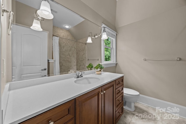 914 Elizabeth Ln, Matthews, NC 28105 - full bath featuring vaulted ceiling, toilet, vanity, tile patterned floors, and baseboards