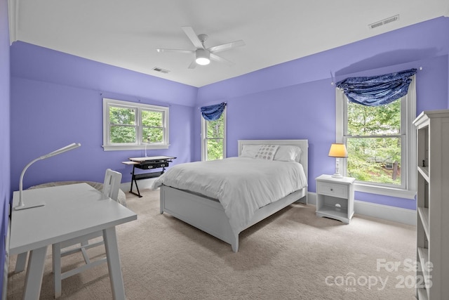 914 Elizabeth Ln, Matthews, NC 28105 - carpeted bedroom featuring a ceiling fan and baseboards