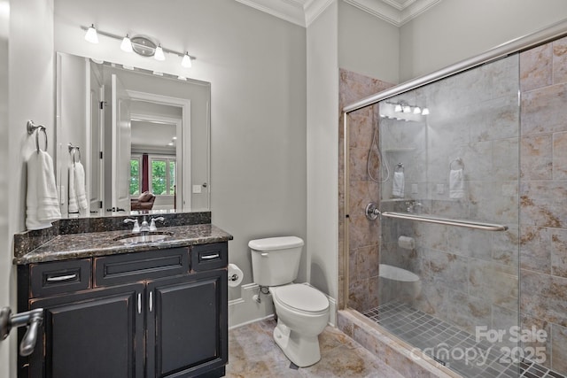 914 Elizabeth Ln, Matthews, NC 28105 - full bathroom with crown molding, a shower stall, toilet, vanity, and baseboards