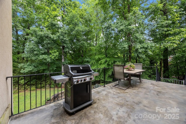 914 Elizabeth Ln, Matthews, NC 28105 - view of patio featuring area for grilling, outdoor dining area, and a balcony