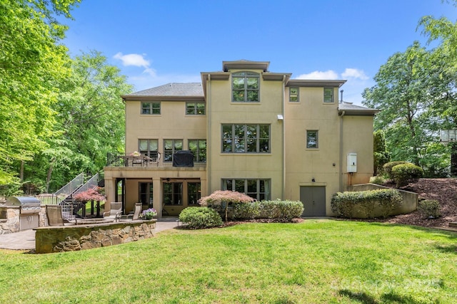 914 Elizabeth Ln, Matthews, NC 28105 - rear view of house with a lawn, stucco siding, a patio, and stairway