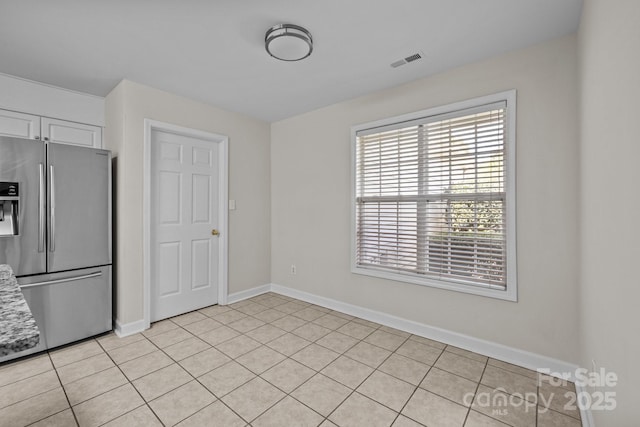 interior space featuring visible vents and baseboards