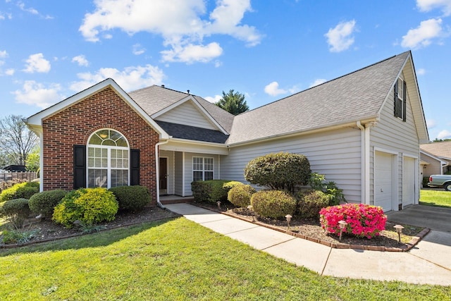 view of front facade with a garage, brick siding, a front lawn, driveway, and roof with shingles