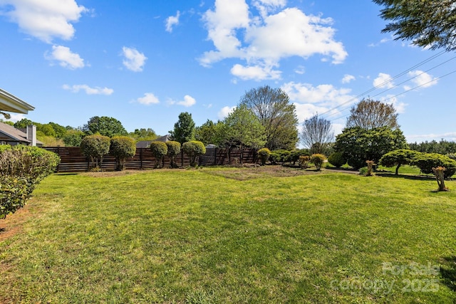 view of yard with fence
