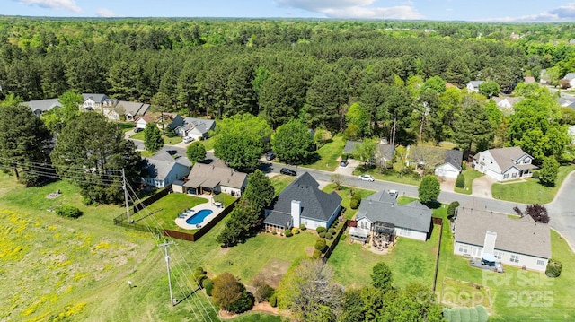 bird's eye view with a view of trees and a residential view