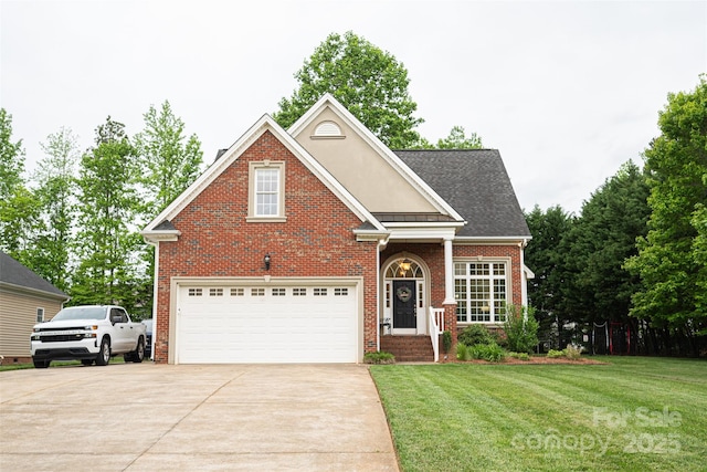 traditional-style house with an attached garage, a front lawn, driveway, and brick siding