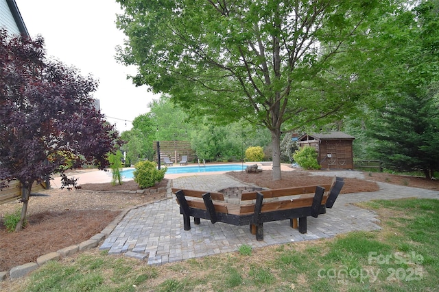view of patio / terrace featuring an outdoor pool