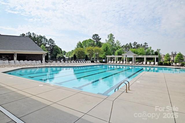 community pool with a patio