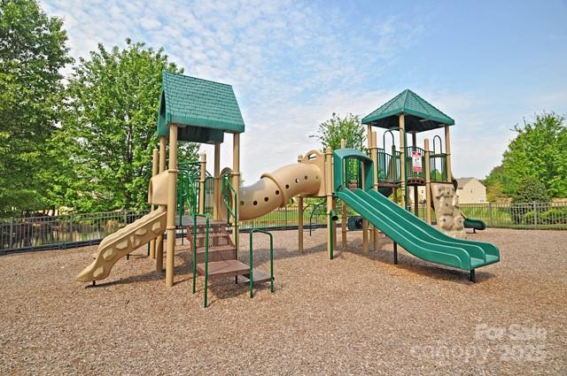 community playground featuring fence