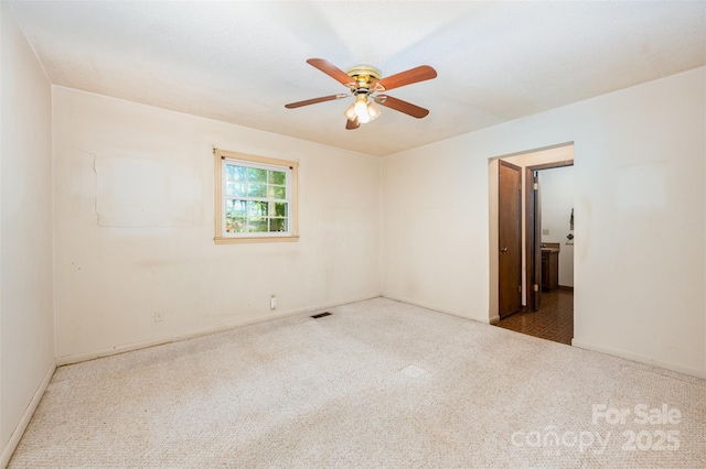 2415 Hargette Rd, Monroe, NC 28112 - carpeted spare room with visible vents, baseboards, and a ceiling fan
