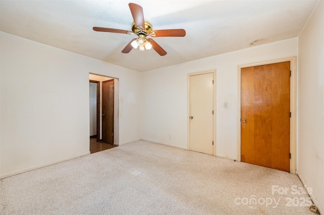 2415 Hargette Rd, Monroe, NC 28112 - unfurnished bedroom featuring carpet flooring and a ceiling fan