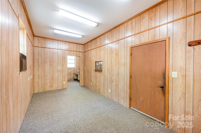 2415 Hargette Rd, Monroe, NC 28112 - carpeted empty room with wood walls