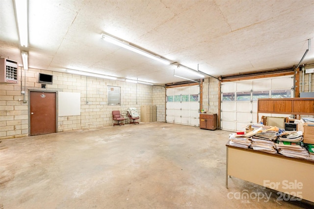 2415 Hargette Rd, Monroe, NC 28112 - garage featuring concrete block wall