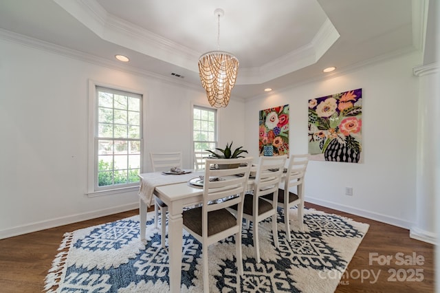 108 Tall Oak Dr, Mooresville, NC 28117 - dining area featuring visible vents, a raised ceiling, an inviting chandelier, dark wood finished floors, and crown molding