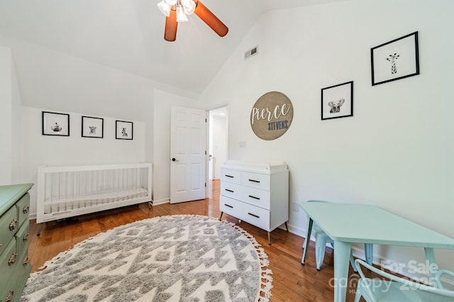 108 Tall Oak Dr, Mooresville, NC 28117 - bedroom with wood finished floors, high vaulted ceiling, baseboards, and visible vents
